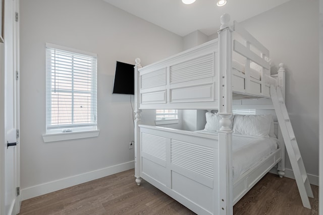 bedroom featuring hardwood / wood-style flooring