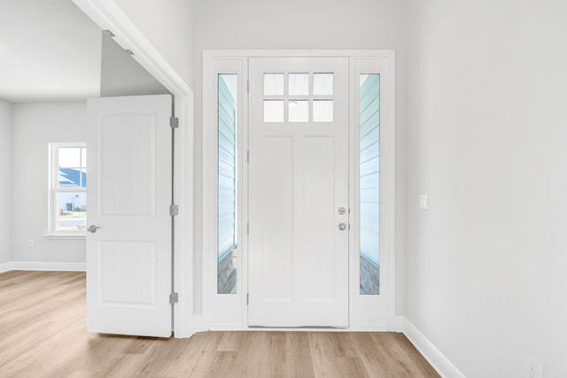 foyer entrance featuring light wood-type flooring