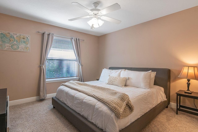 2240 Hadleigh Hills Ct, Navarre, FL 32566 - bedroom with light carpet, baseboards, and ceiling fan