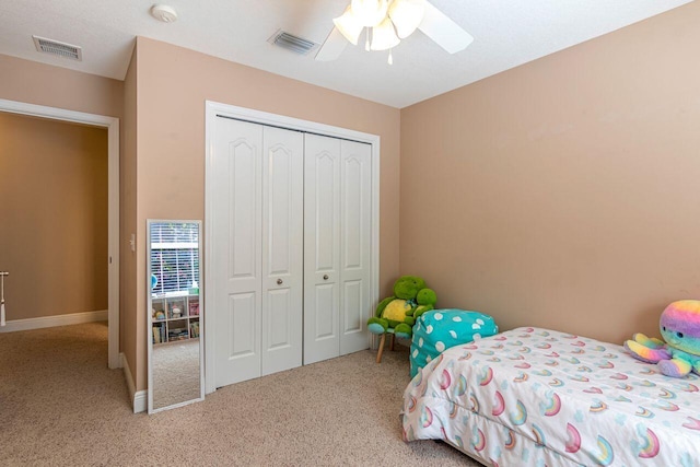 2240 Hadleigh Hills Ct, Navarre, FL 32566 - carpeted bedroom featuring a closet and a ceiling fan