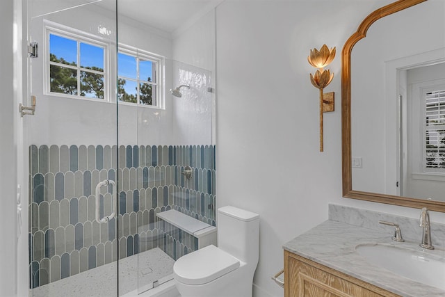 bathroom featuring an enclosed shower, toilet, ornamental molding, and vanity