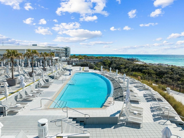 view of pool featuring a water view