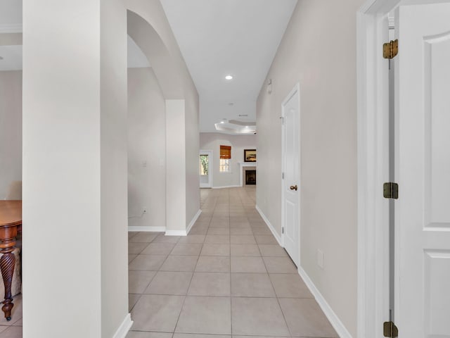 hallway with light tile patterned floors