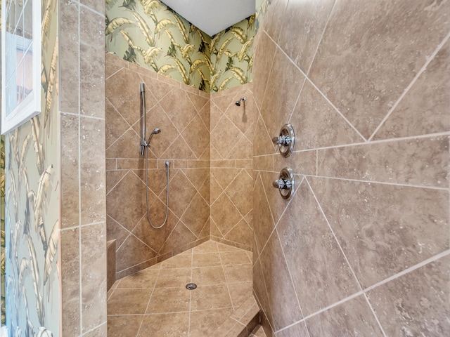 bathroom with tiled shower