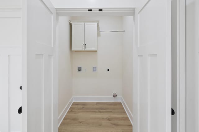 clothes washing area with light wood finished floors, baseboards, washer hookup, cabinet space, and hookup for an electric dryer