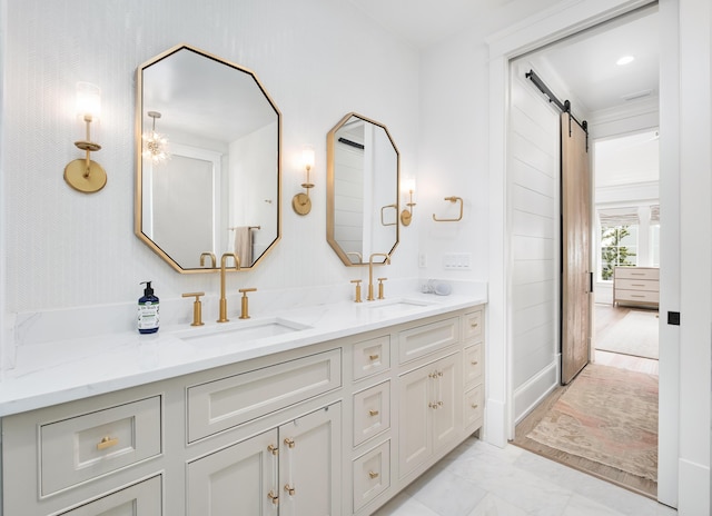 full bath with double vanity and a sink