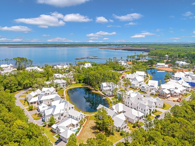 drone / aerial view with a water view