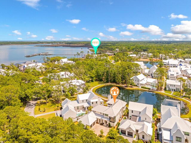 birds eye view of property featuring a water view