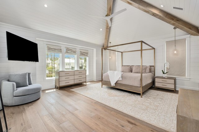 bedroom with light wood-type flooring, high vaulted ceiling, and beamed ceiling