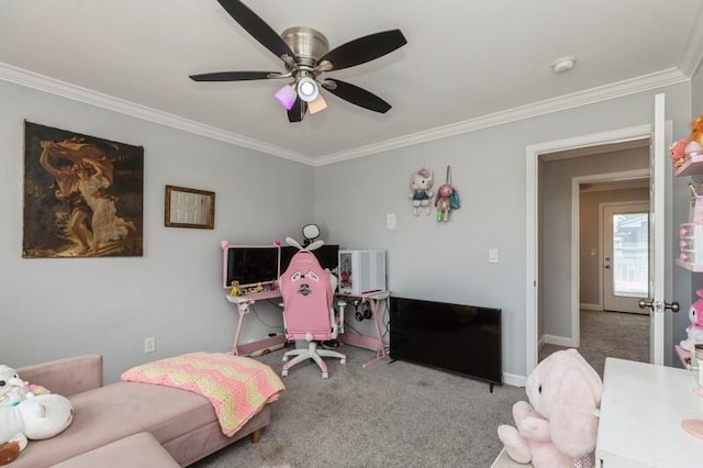 carpeted office featuring baseboards, ornamental molding, and ceiling fan