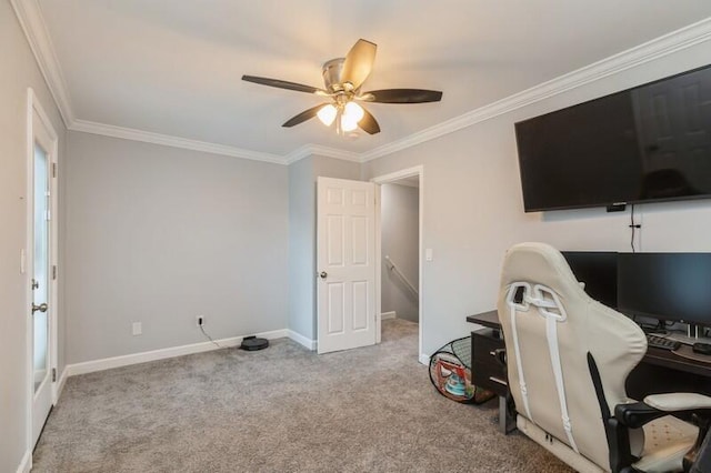 office featuring baseboards, ornamental molding, a ceiling fan, and light colored carpet