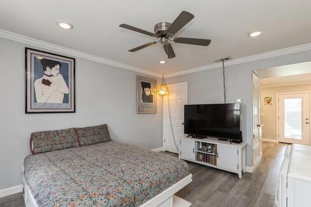 bedroom featuring baseboards, visible vents, ornamental molding, and dark wood-style flooring