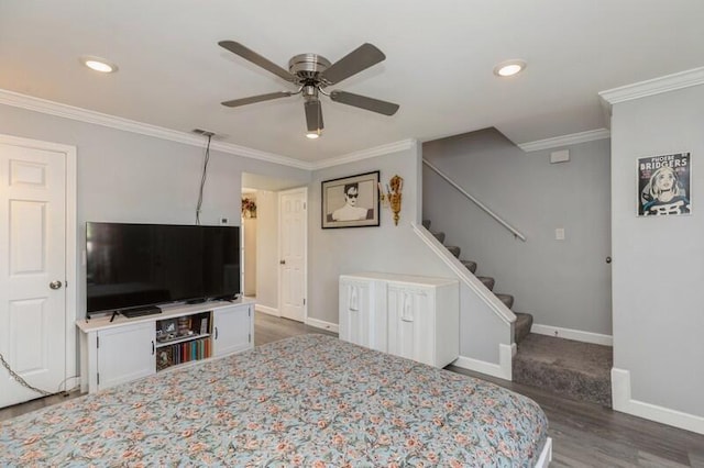 bedroom with recessed lighting, a ceiling fan, baseboards, ornamental molding, and dark wood finished floors