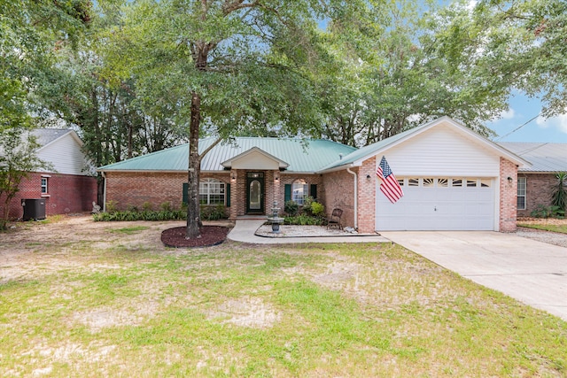 ranch-style house with a garage and a front lawn