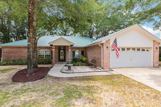 ranch-style home with a garage