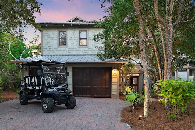 view of front of home with a garage