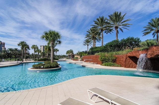 view of pool featuring a patio and pool water feature