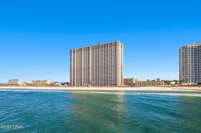 property view of water featuring a beach view