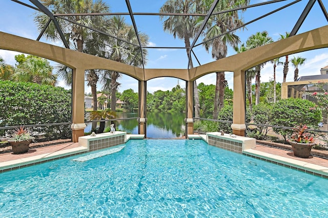 view of pool with a lanai