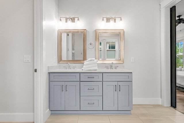 bathroom featuring tile patterned floors and vanity