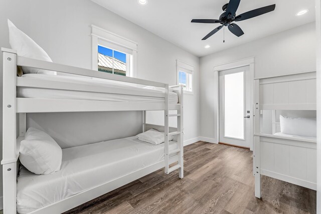 bedroom featuring ceiling fan and hardwood / wood-style floors