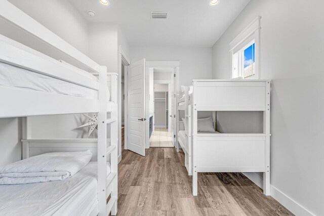 bedroom featuring hardwood / wood-style floors