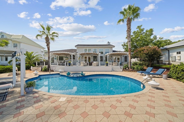 view of pool featuring a pergola and a patio