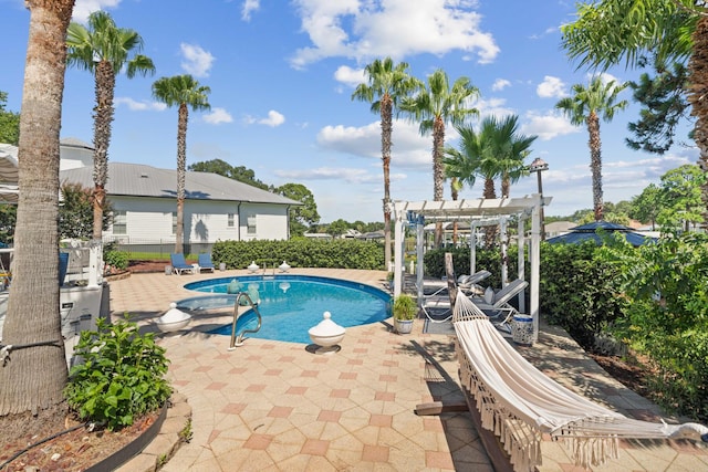 view of pool featuring a pergola and a patio area