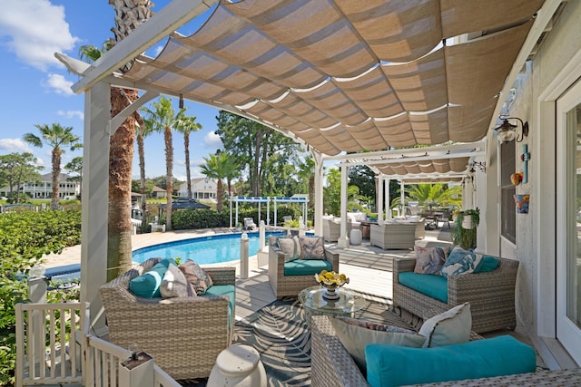 exterior space featuring an outdoor hangout area and a pergola