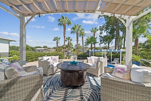 view of patio featuring a pergola and outdoor lounge area