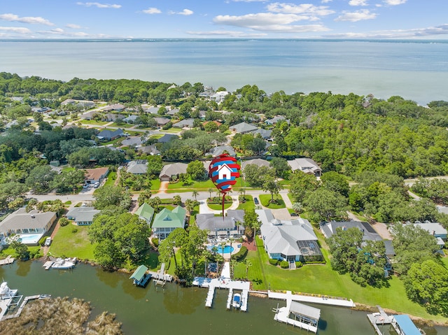 bird's eye view with a water view