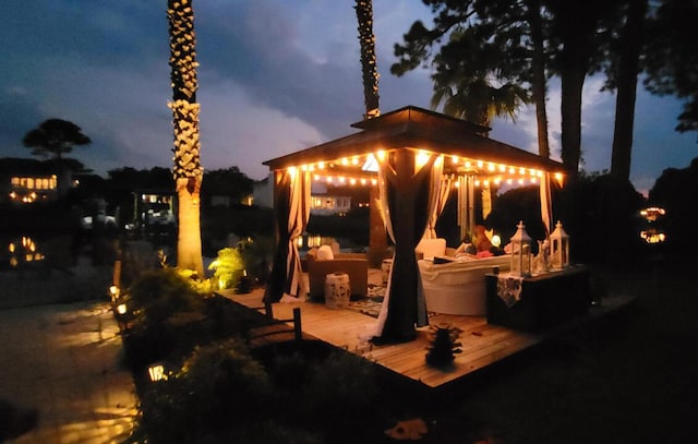 patio terrace at dusk with a gazebo