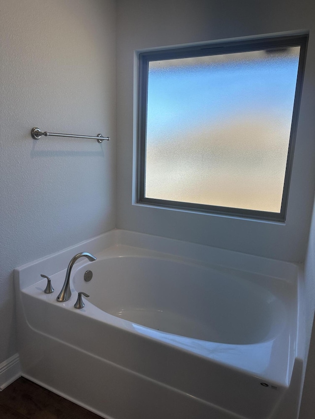 bathroom with a bath