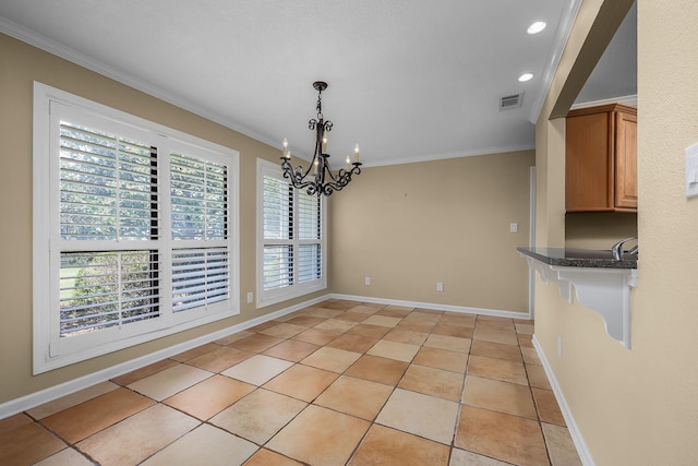 unfurnished dining area with a notable chandelier, ornamental molding, and light tile patterned floors