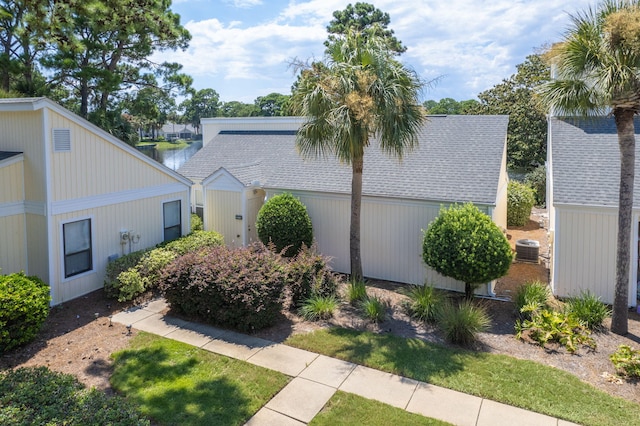 view of side of property featuring cooling unit