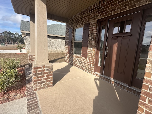 entrance to property with a porch