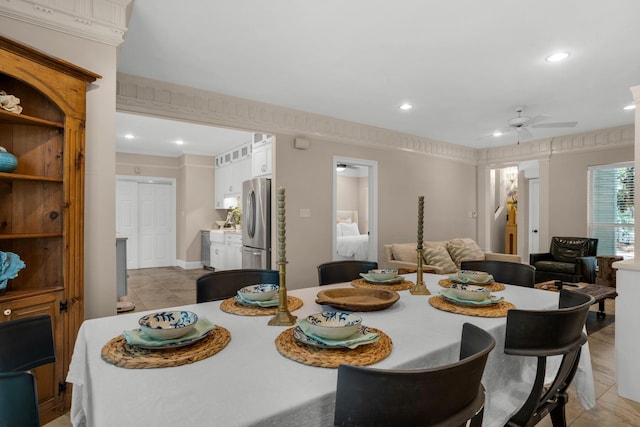 dining room with light tile patterned floors, a ceiling fan, and recessed lighting