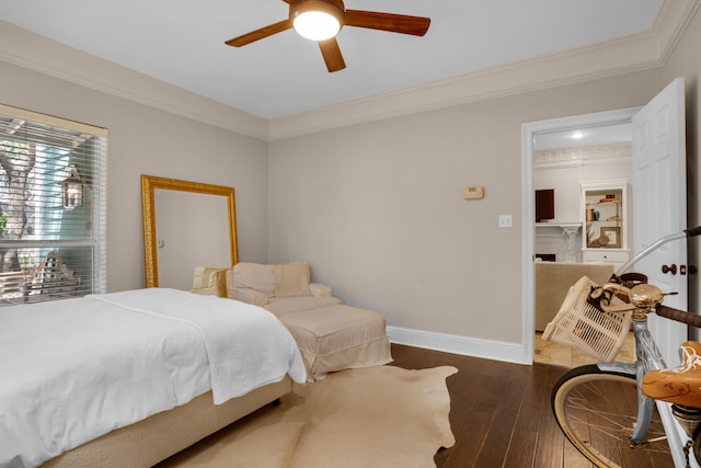 bedroom with ornamental molding, hardwood / wood-style floors, and ceiling fan