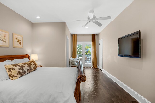 bedroom featuring dark wood-type flooring, access to outside, french doors, and ceiling fan