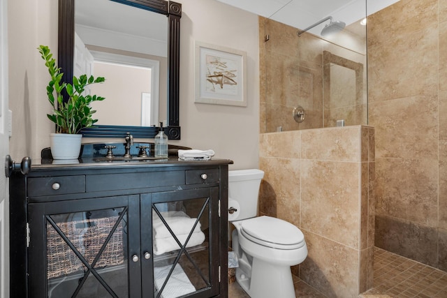 bathroom with a walk in shower, vanity, and toilet