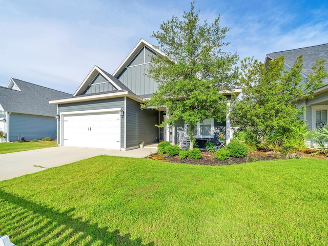 craftsman-style house featuring a garage and a front lawn