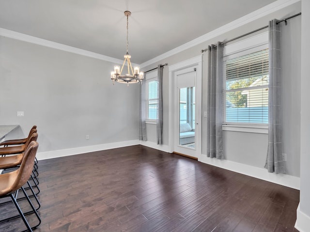 unfurnished dining area with ornamental molding, a notable chandelier, and dark hardwood / wood-style flooring