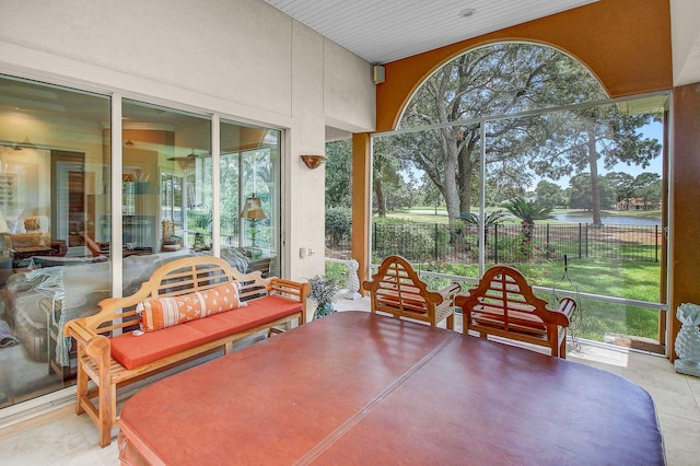 sunroom / solarium with a wealth of natural light