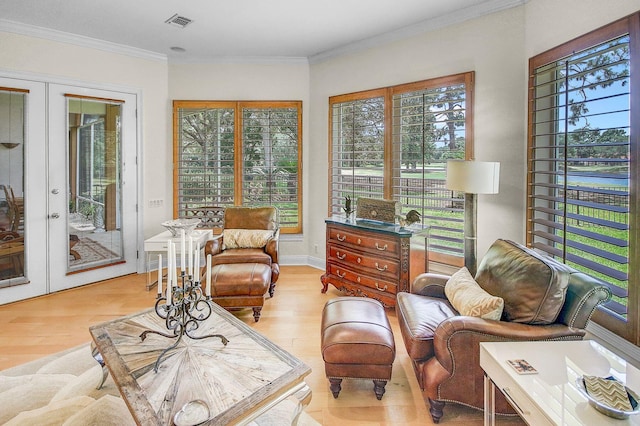 sunroom / solarium with a wealth of natural light and french doors