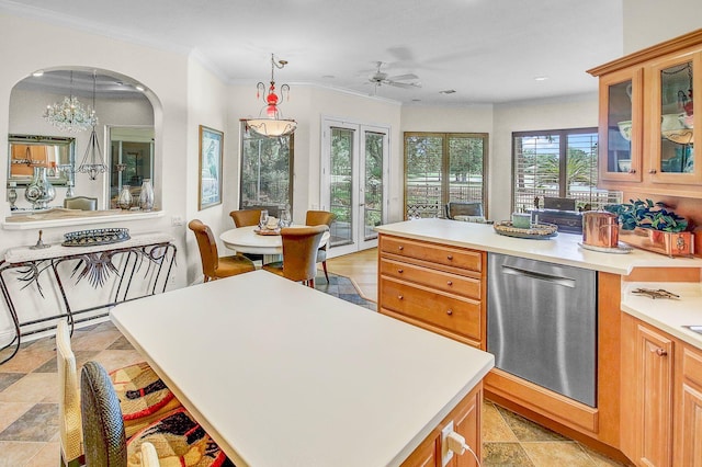 kitchen with french doors, a center island, dishwasher, and hanging light fixtures