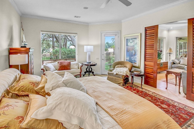 bedroom featuring ornamental molding, access to outside, hardwood / wood-style flooring, and ceiling fan