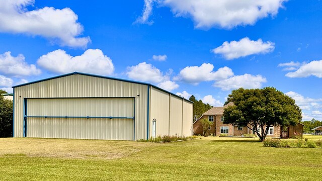 garage with a lawn