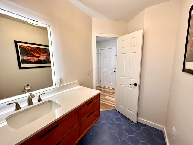 bathroom with vanity and tile patterned flooring