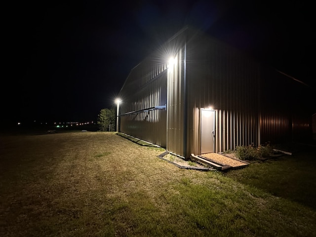 view of yard at night