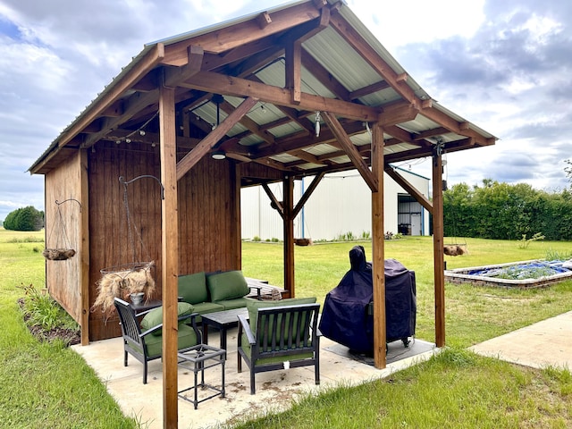 view of patio featuring a grill, a gazebo, and an outdoor hangout area